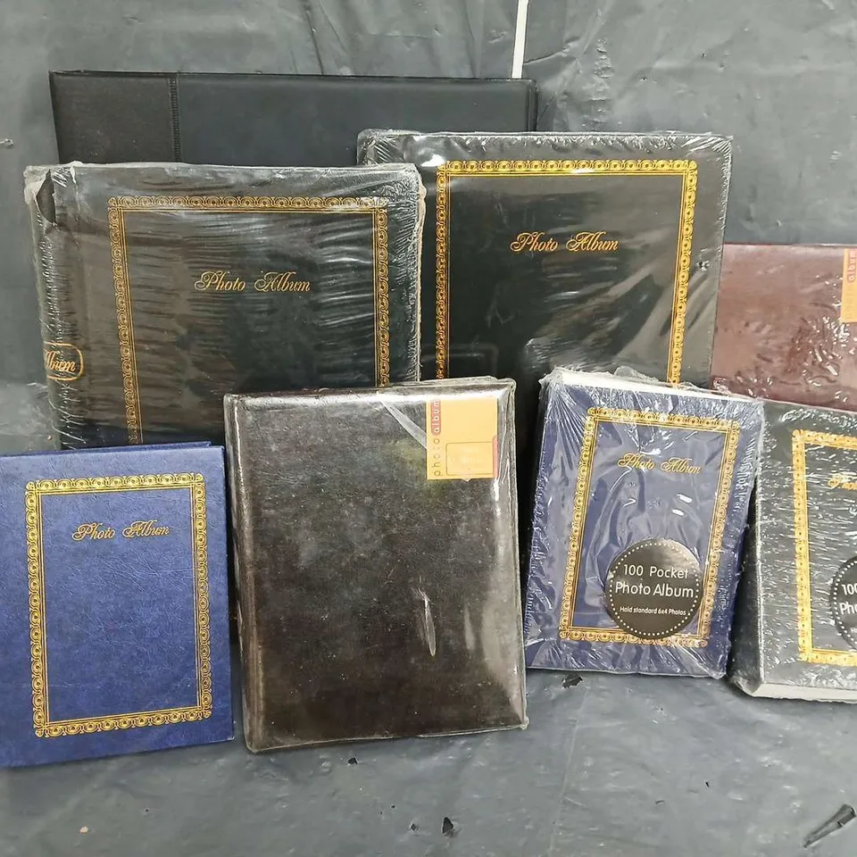 APPROXIMATELY 8 ASSORTED PHOTO ALBUMS AND BUSINESS CARD BOOK