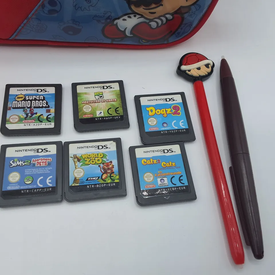 NINTENDO SWITCH DS LITE WITH CARRY CASE, PENS AND 6 GAMES