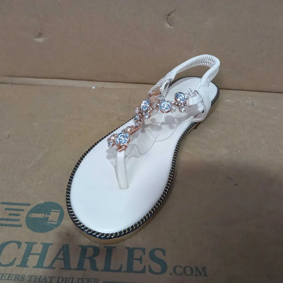 BOXED PAIR OF DESIGNER JEWEL EFFECT FLAT SANDALS IN BEIGE EU SIZE 39