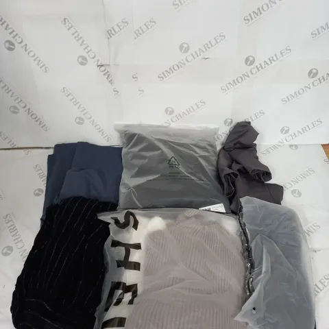 LARGE BOX OF ASSORTED CLOTHING ITEMS IN VARIOUS COLOURS AND SIZES INCLUDING TROUSERS , TOPS AND JUMPERS