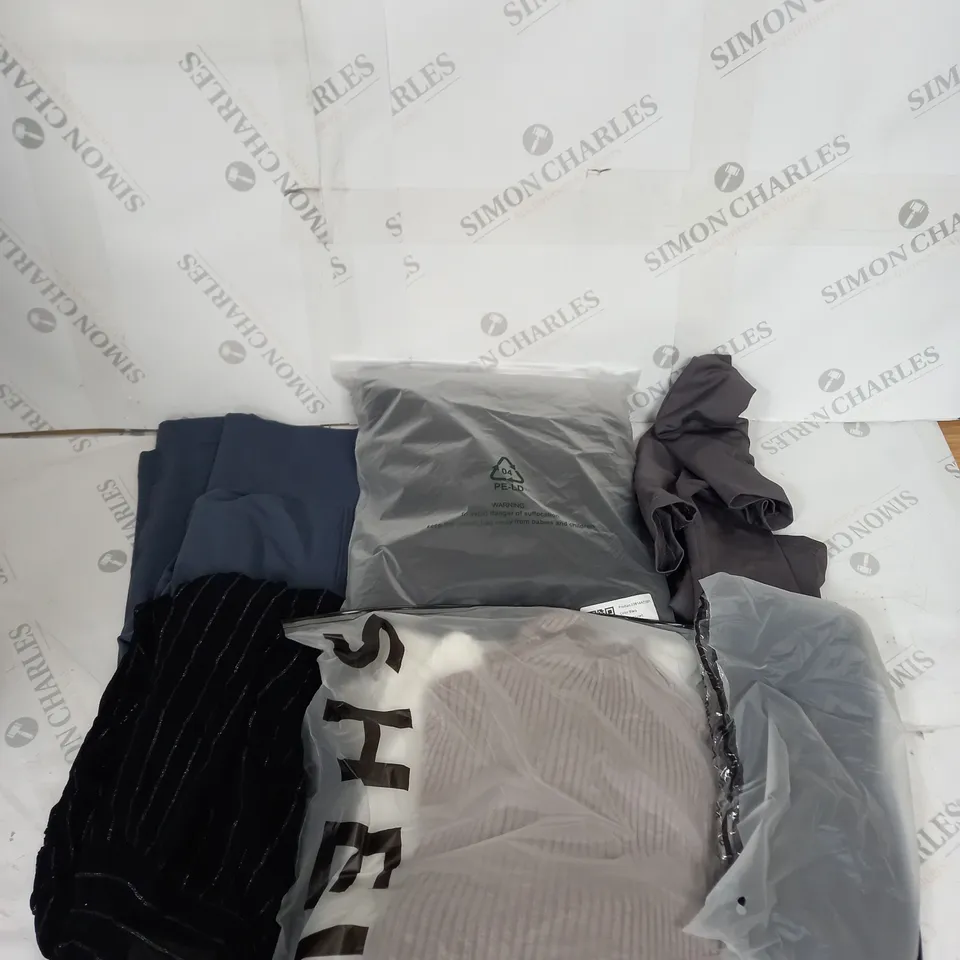 LARGE BOX OF ASSORTED CLOTHING ITEMS IN VARIOUS COLOURS AND SIZES INCLUDING TROUSERS , TOPS AND JUMPERS 