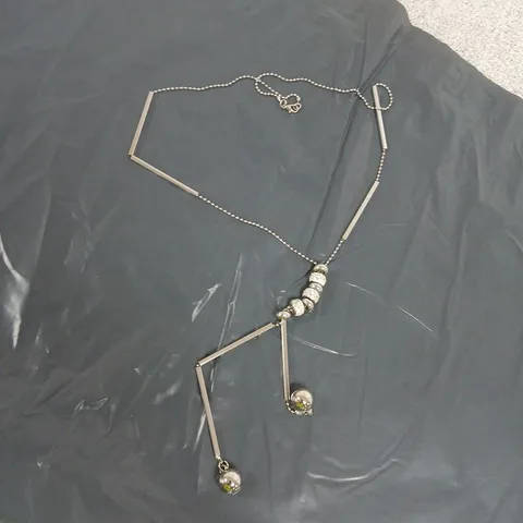 SILVER-TONE NECKLACE WITH RECTANGULAR BAR ACCENTS AND BEADED DROP PENDANT
