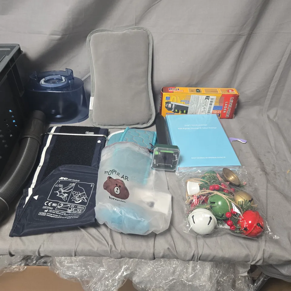 APPROXIMATELY 15 Assorted Tools & Household Items Lot – vacuum hose, cords, rope, manuals, box, decorations