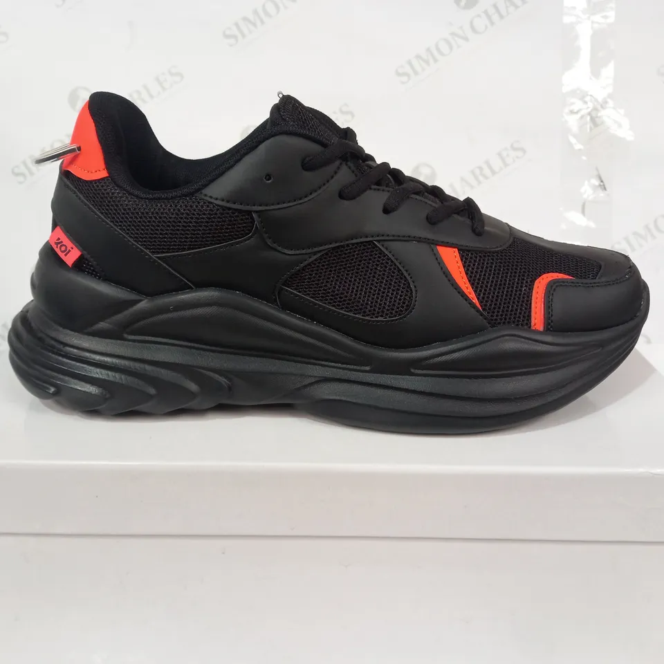 BOXED PAIR OF KOI VEGAN TRAINERS IN BLACK/ORANGE SIZE UNSPECIFIED