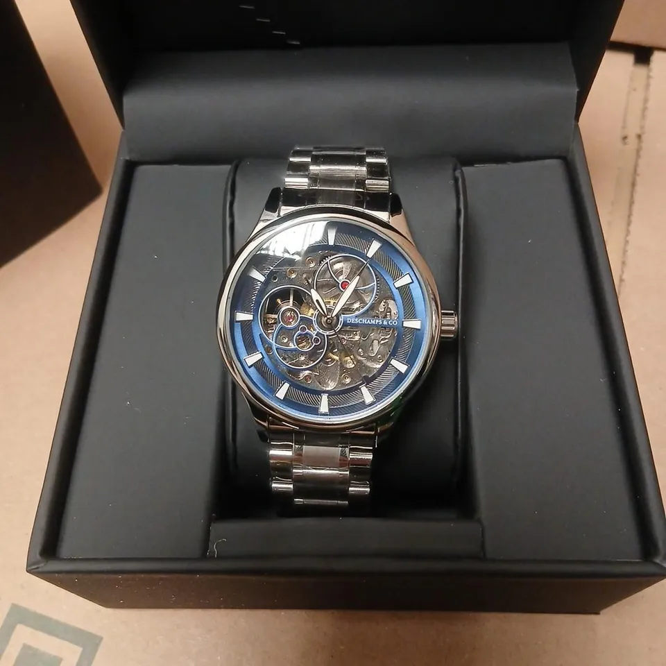 DESCHAMPS & CO SKELETON WATCH – BLUE DIAL, STAINLESS STEEL BRACELET