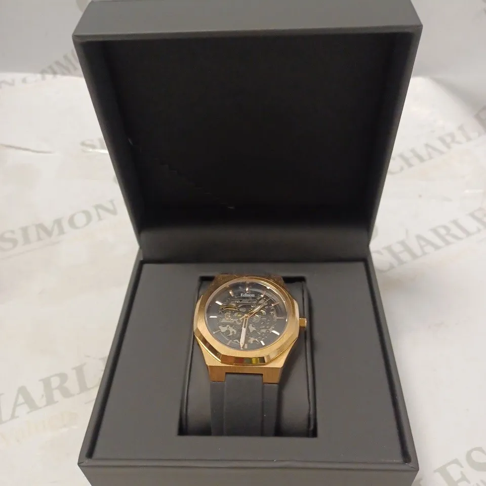 MEN'S EDISON AUTOMATIC ROSE GOLD COLOUR WATCH WITH BLACK DIAL IN HEXAGON CASE