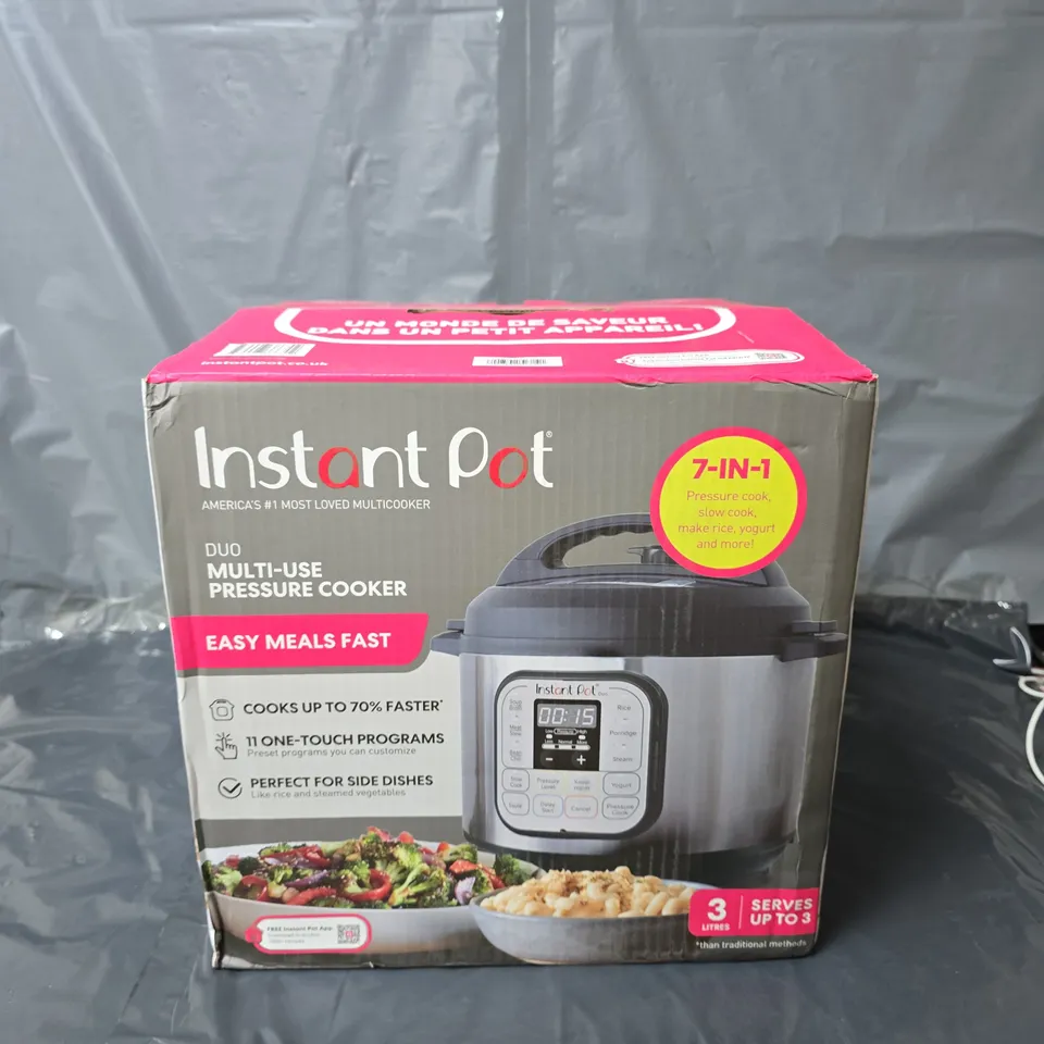 BOXED INSTANT POT DUO MULTI-USE PRESSURE COOKER