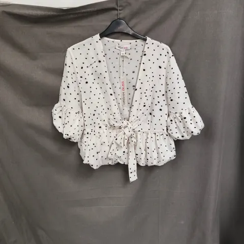BOX OF APPROXIMATELY 90 URBAN BLISS WOMEN'S WHITE POLKA DOT WRAP BLOUSE - SIZES 8 / 10 /12 / 14 / 16 