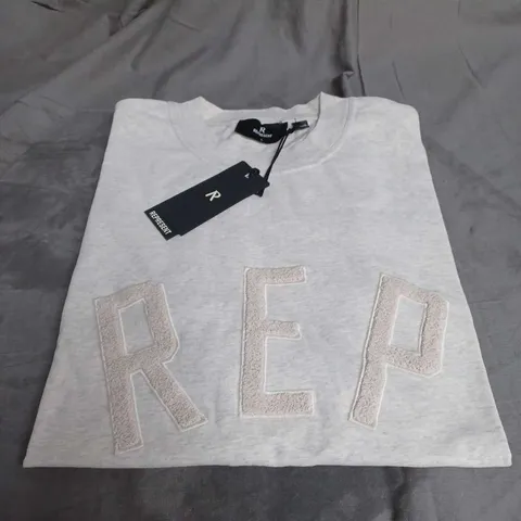 REPRESENT REP APPLIQUE JERSEY TSHIRT IN CREAM MARL SIZE L