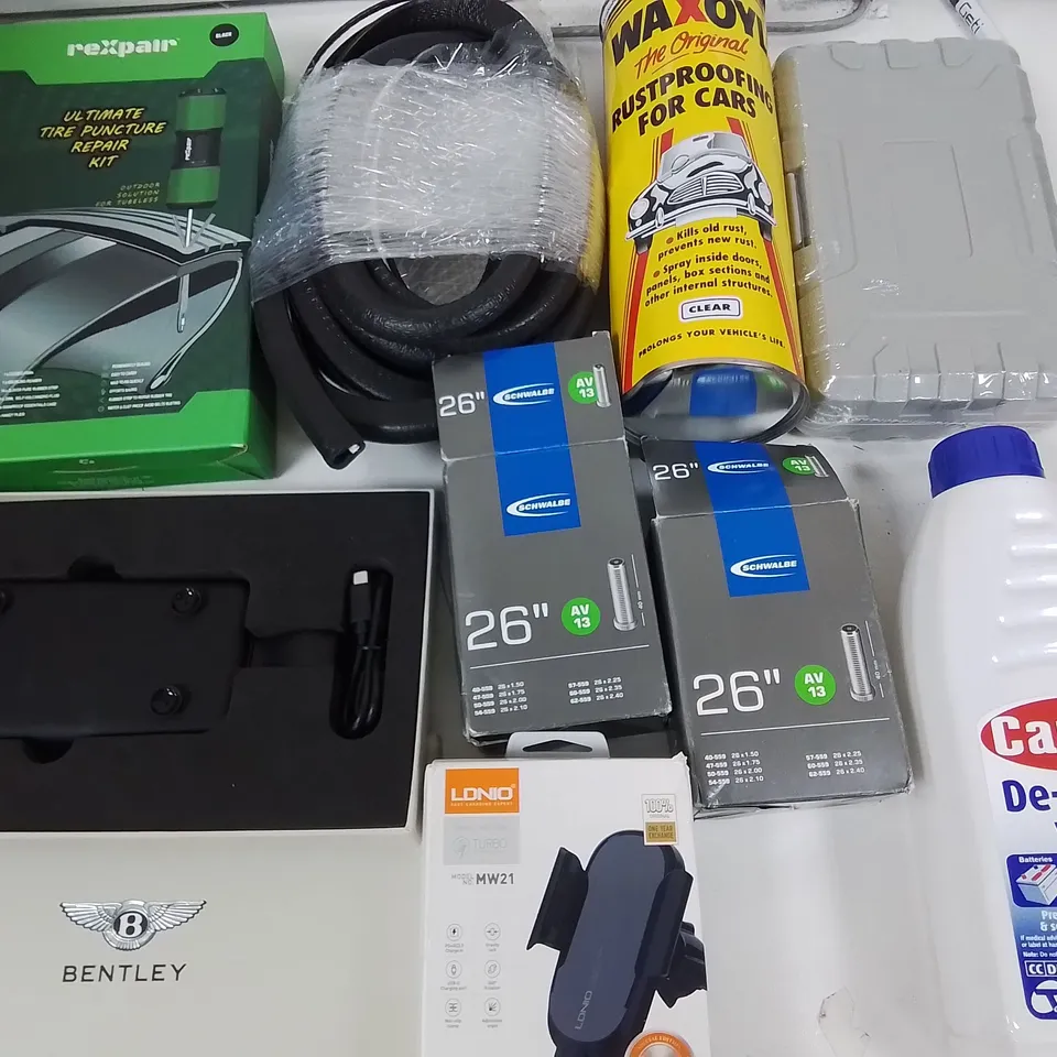 LOT OF ASSORTED AUTO AND VEHICLE PARTS TO INCLUDE TIRE PUNCTURE REPAIR KIT,CAR RUSTPROOFING AND INNER TUBES