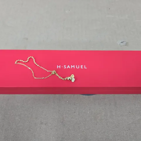 H.SAMUEL YELLOW GOLD BOLO BRACELET 