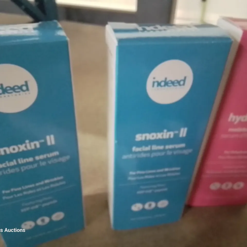 BOX OF ASSORTED INDEED SERUMS & TREATMENTS