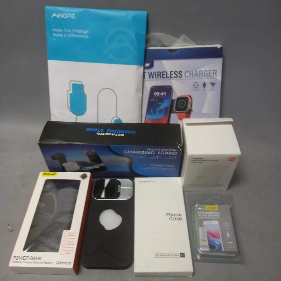 APPROXIMATELY 10 ASSORTED ITEMS TO INCLUDE - FAST WIRELESS CHARGER - IPHONE 15 PRO MAX PHONE CASE - XIAOMI WIRELESS CHARGING STAND - ETC