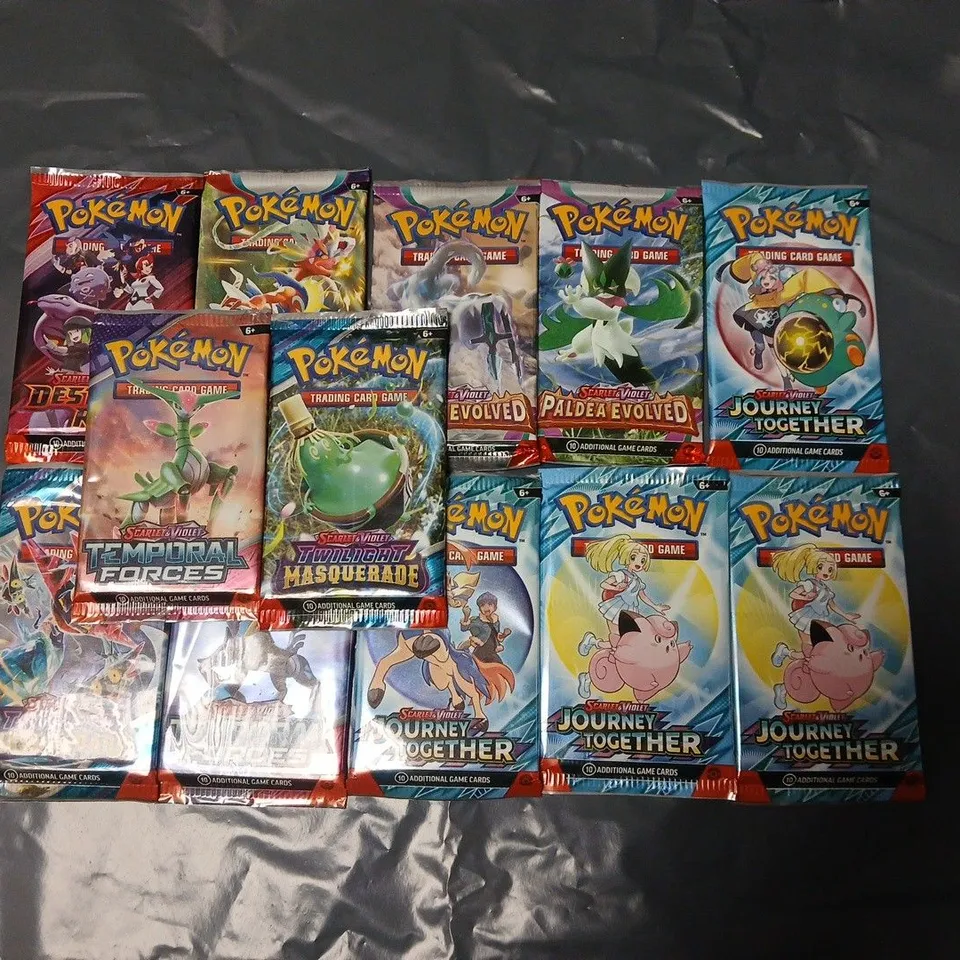 LOT OF APPROXIMATELY 24 PACKS OF ASSORTED POKEMON 10-PACKS TRADING CARDS