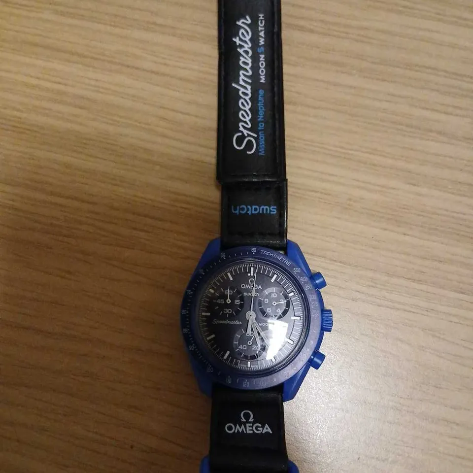 OMEGA SPEEDMASTER MOONWATCH CHRONOGRAPH – BLUE CASE, BLACK STRAP