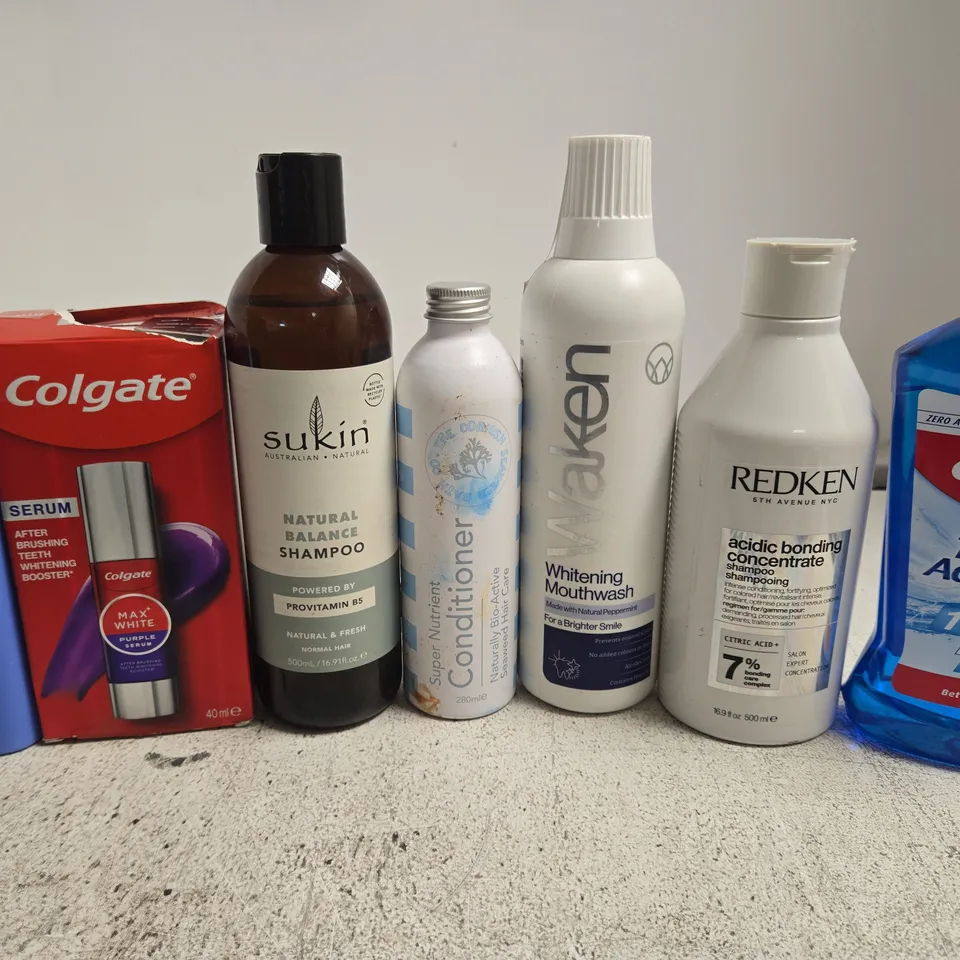 APPROX 12 ASSORTED BEAUTY PRODUCTS TO INCLUDE COLGATE TEETH WHITENENING KIT, SUKIN SHAMPOO, REDKEN SHAMPOO, ETC
