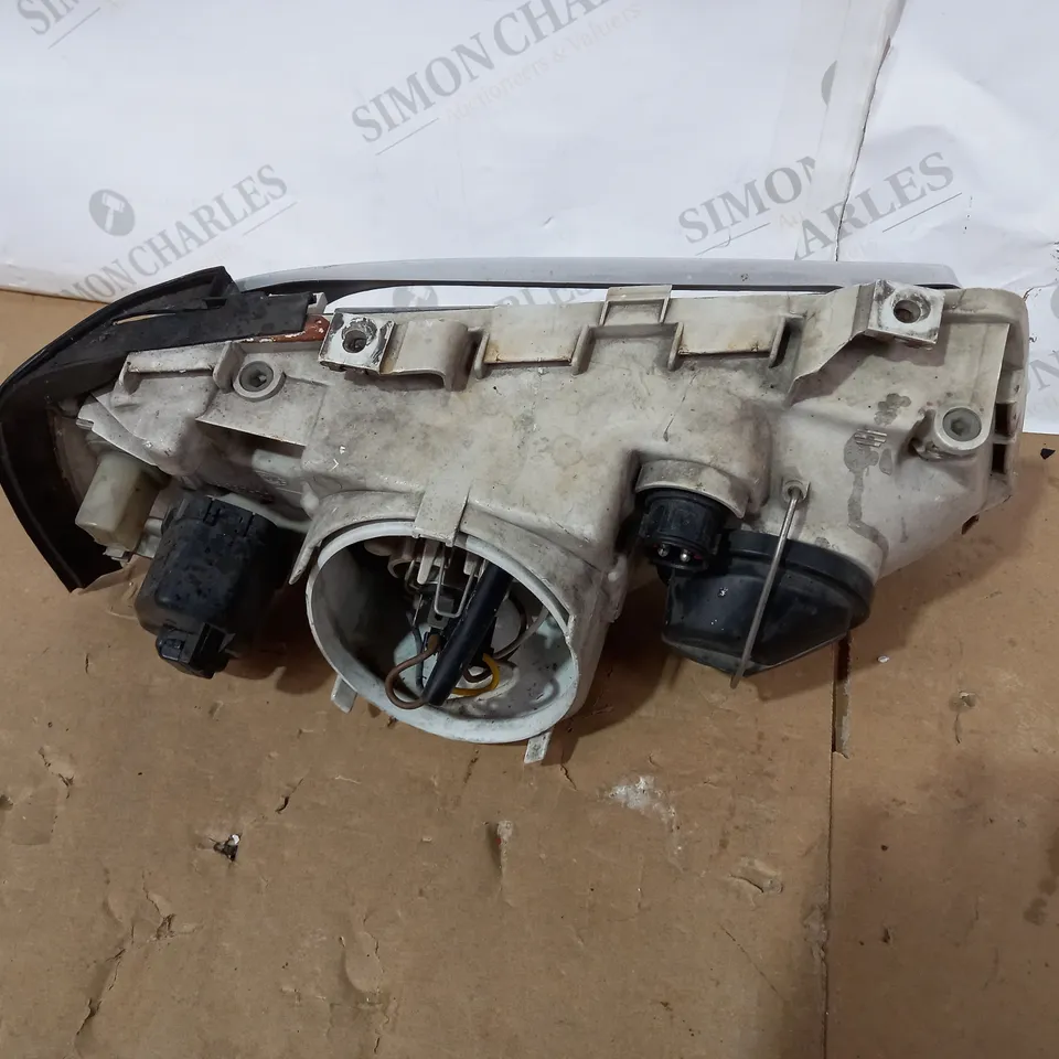 HELLA FRONT LEFT HEADLIGHT