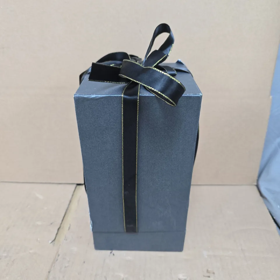 LED ILLUMINATED GLASS DOME ORNAMENT WITH IRIDESCENT ROSE ON DARK DISPLAY BASE