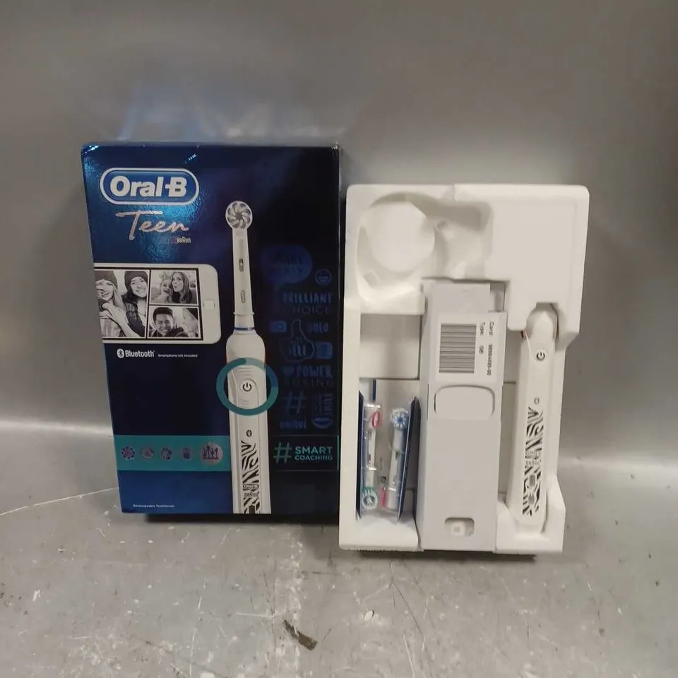 BOXED ORAL B TEEN RECHARGABLE TOOTHBRUSH IN WHITE ZEBRA