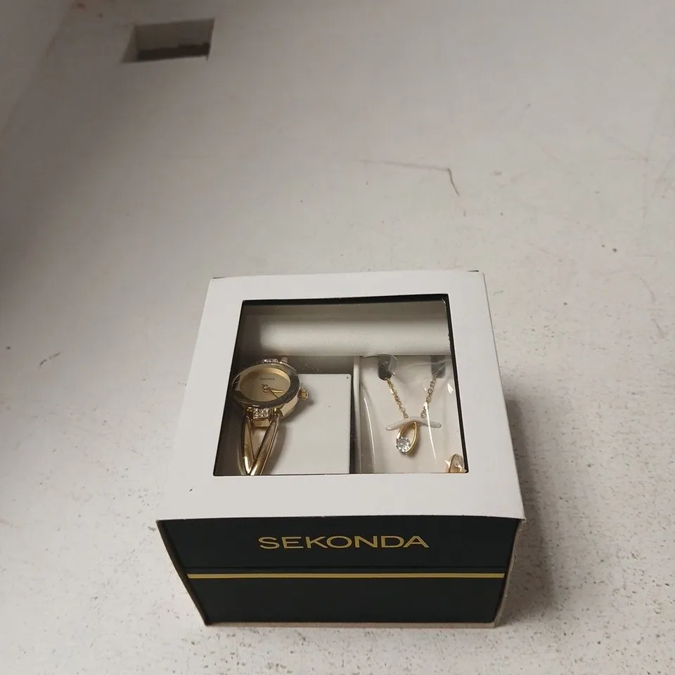 SEKONDA LADIES' JEWELLERY SET: GOLD-TONE WATCH WITH CRYSTALS + NECKLACE IN PRESENTATION BOX
