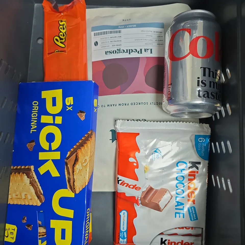 APPROXIMATELY 10 ASSORTED FOOD/DRINK PRODUCTS TO INCLUDE REESE'S, JELLY BEANS, DIET COKE ETC 