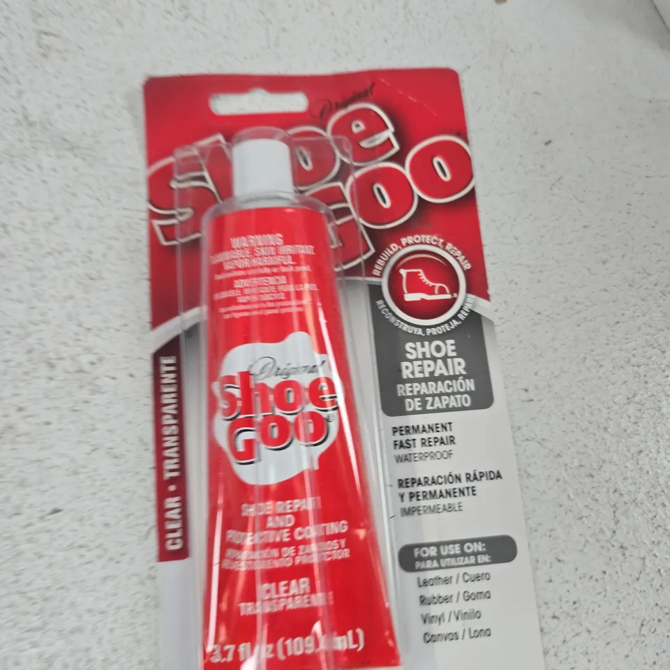 TOTE OF APPROXIMATELY 14 ASSORTED ITEMS TO INCLUDE: SHOE GOO