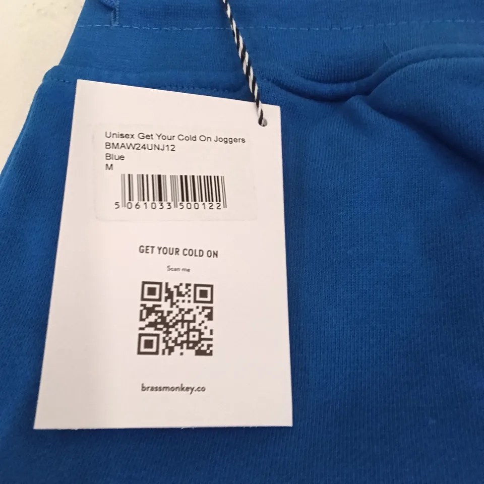BOX OF BRASS MONKEY JOGGERS - BLUE SIZE M APPROXIMATELY 12