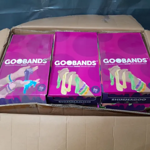 APPROXIMATELY 15 GOOBANDS SHIMMAGOOD BRACELETS BOXES 