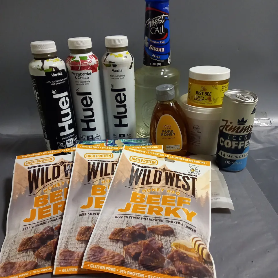 APPROXIMATELY 10 ASSORTED FOOD/DRINK ITEMS TO INCLUDE - WILDWEST HONEY BBQ BEEF JERKY - ORIGIN ORGANIC TALLOW FAT - JUST BEE VITALITY HONEY - ETC