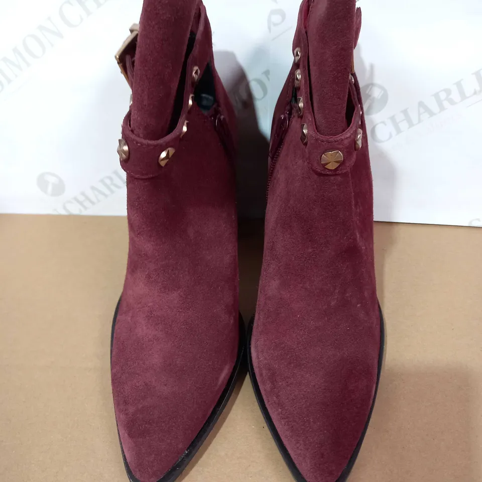 BOXED PAIR OF BRONX POINTED ANKLE BOOT WITH STUDDED BUCKLE DETAIL - BURGUNDY UK SIZE 6