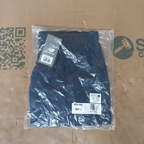 BAGGED NEW BALANCE 7" SHORTS IN NAVY SIZE LARGE