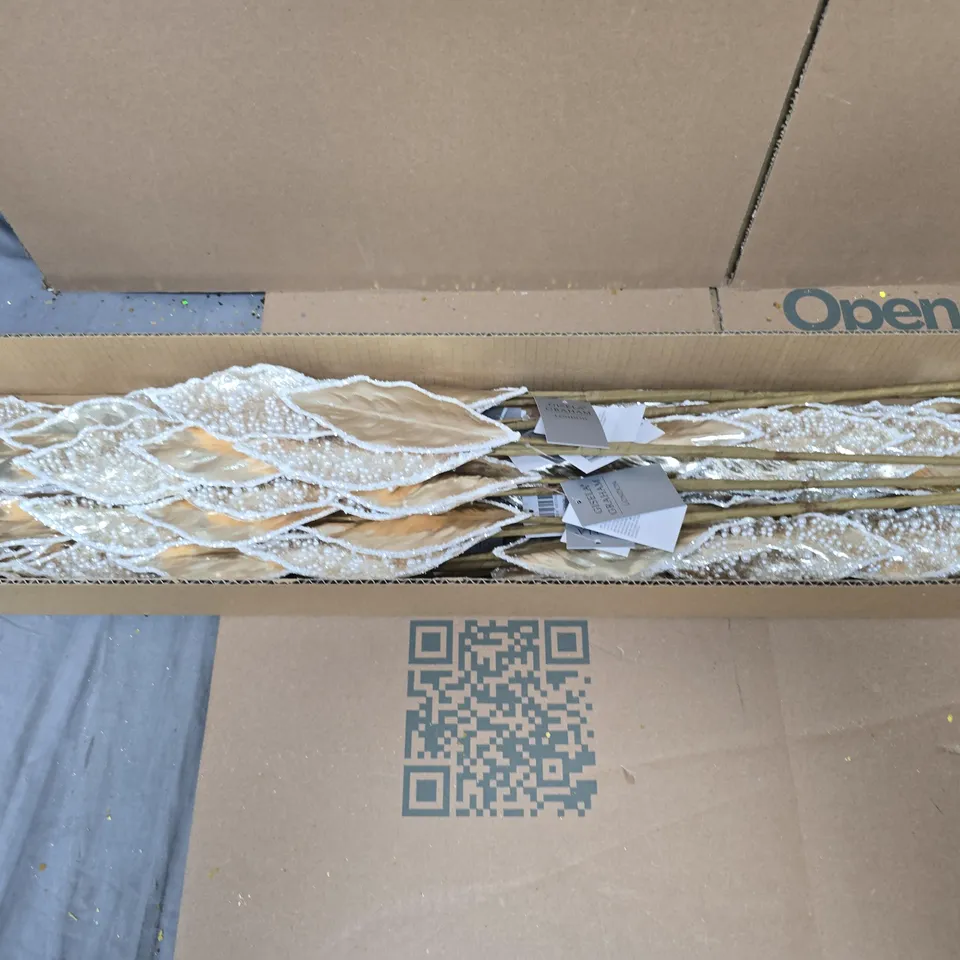 BOX OF APPROXIMATELY 12 GISELA GRAHAM WHITE AND GOLD FAUX LEAF ARRANGEMENTS