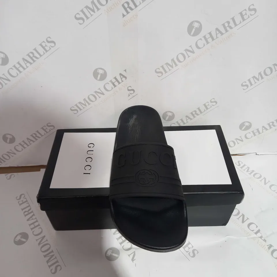 BOXED PAIR OF GUCCI BLACK SLIDES SIZE 44