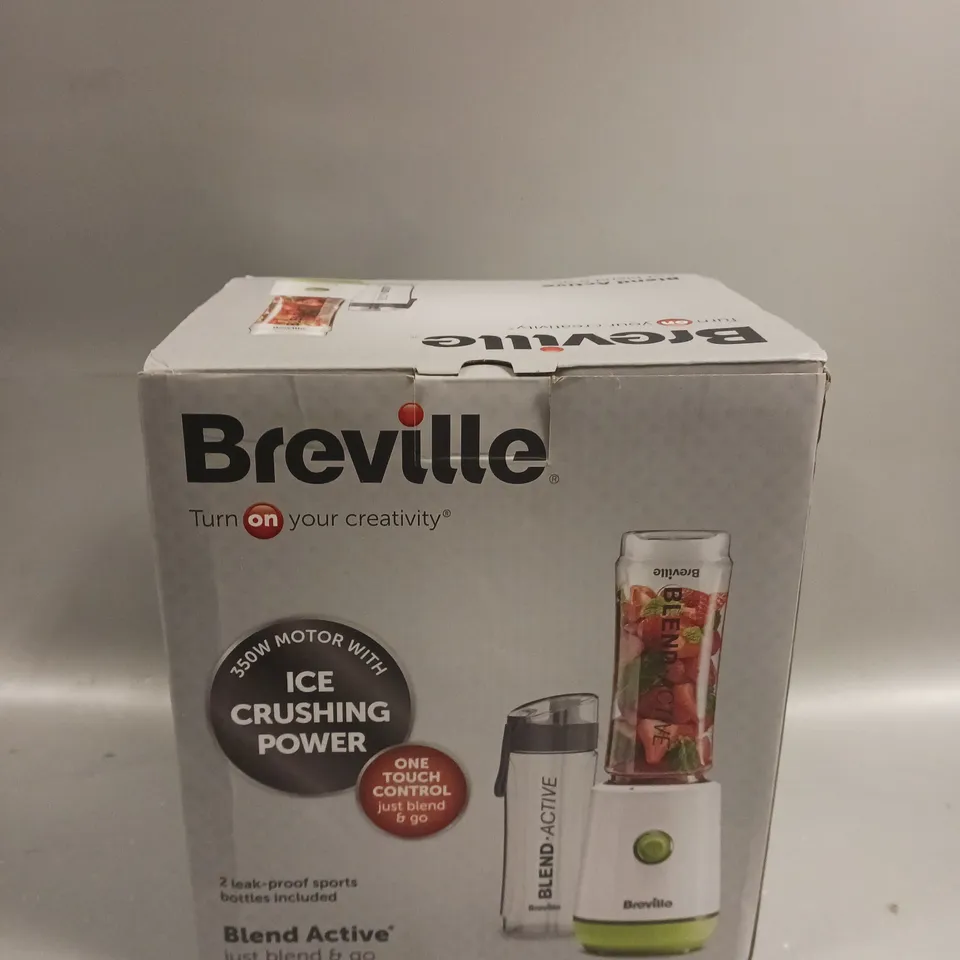 boxed BREVILLE blend active blend and go includes 2 leak proof sports bottles. 