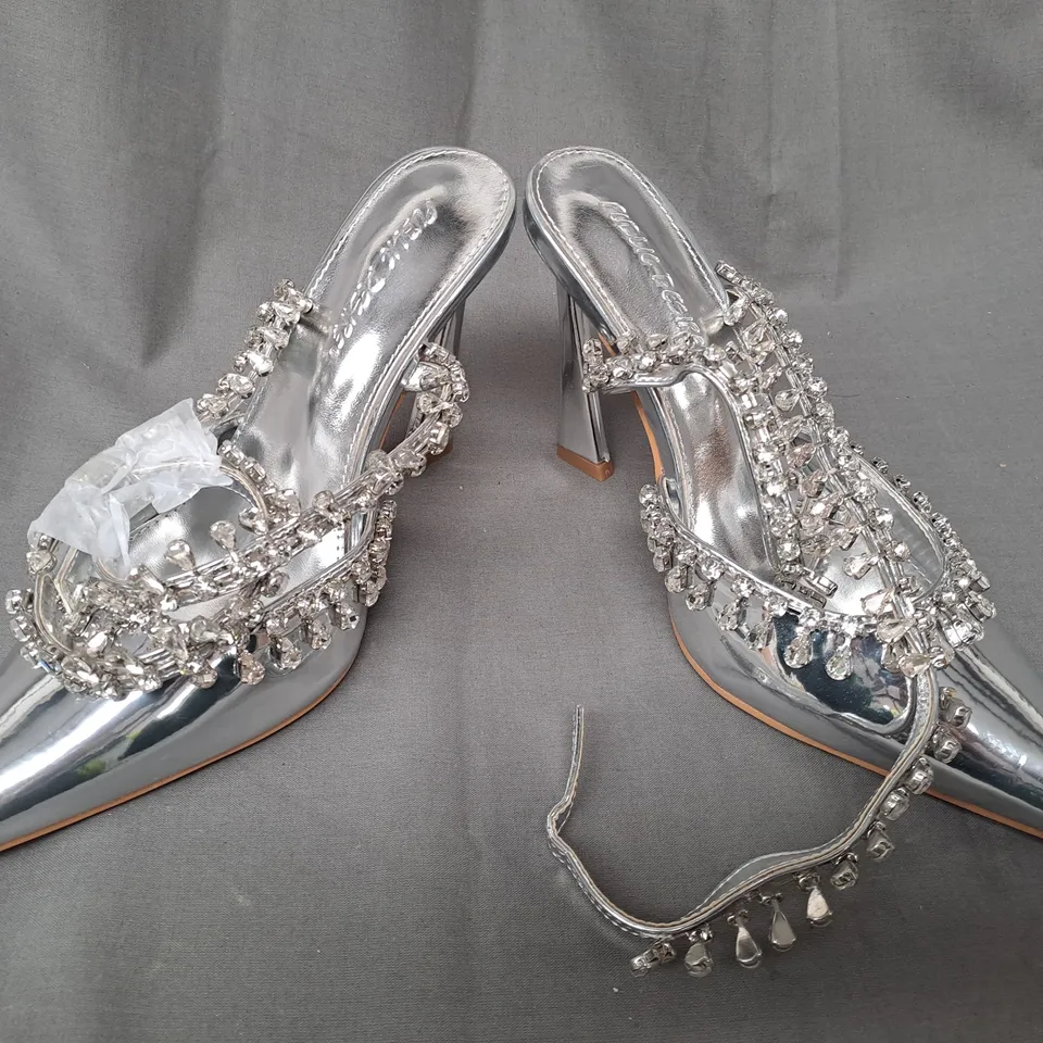 BOXED PAIR OF PUBLIC DESIRE POINTED TOE HEELED SHOES IN METALLIC SILVER W. JEWEL EFFECT SIZE 4