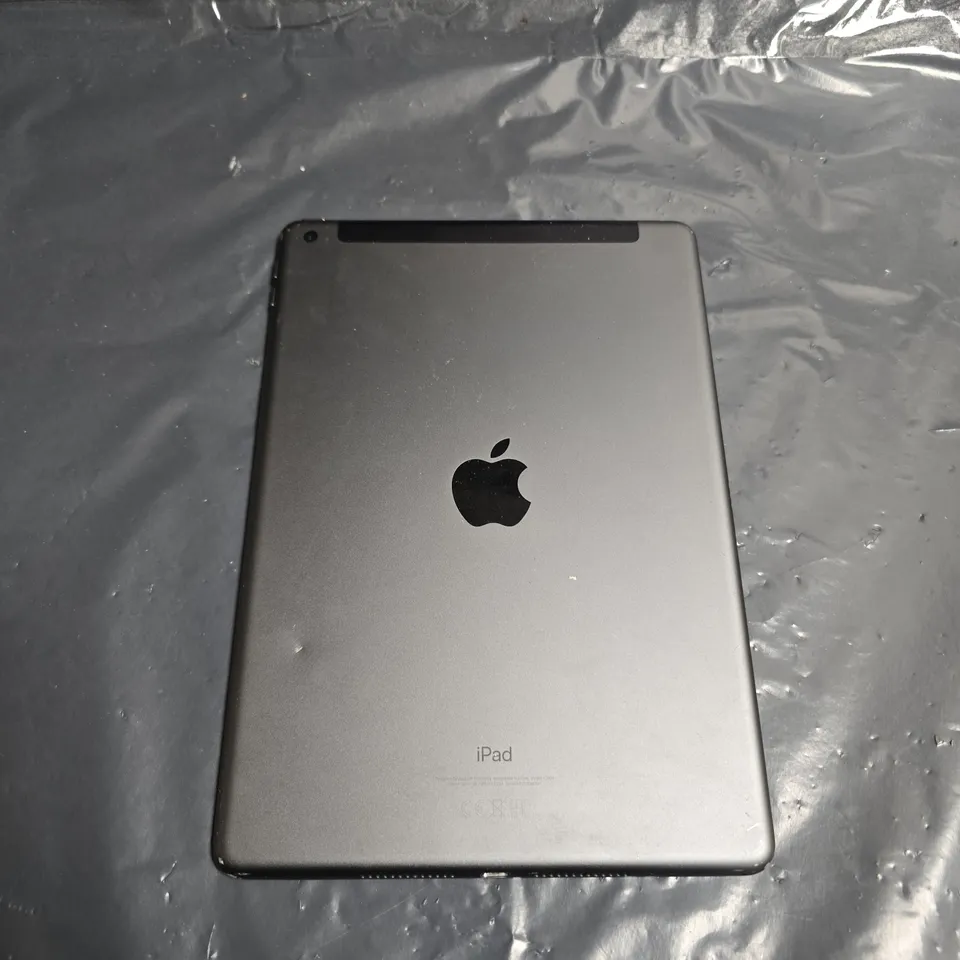 APPLE IPAD TABLET – FRONT GLASS CRACKED WITH SPIDERWEB DAMAGE.