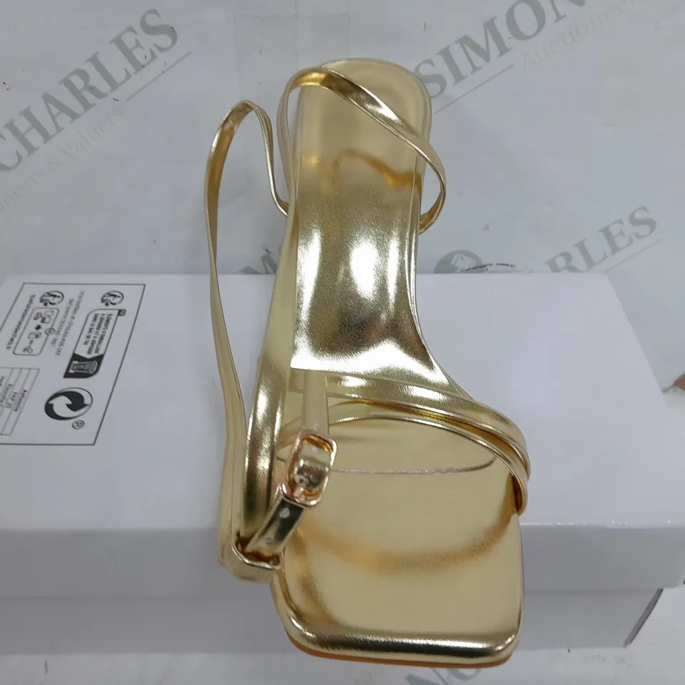 BOXED PAIR OF ASTUCCIO OPEB TOE HEELS IN GOLD - SIZE 38