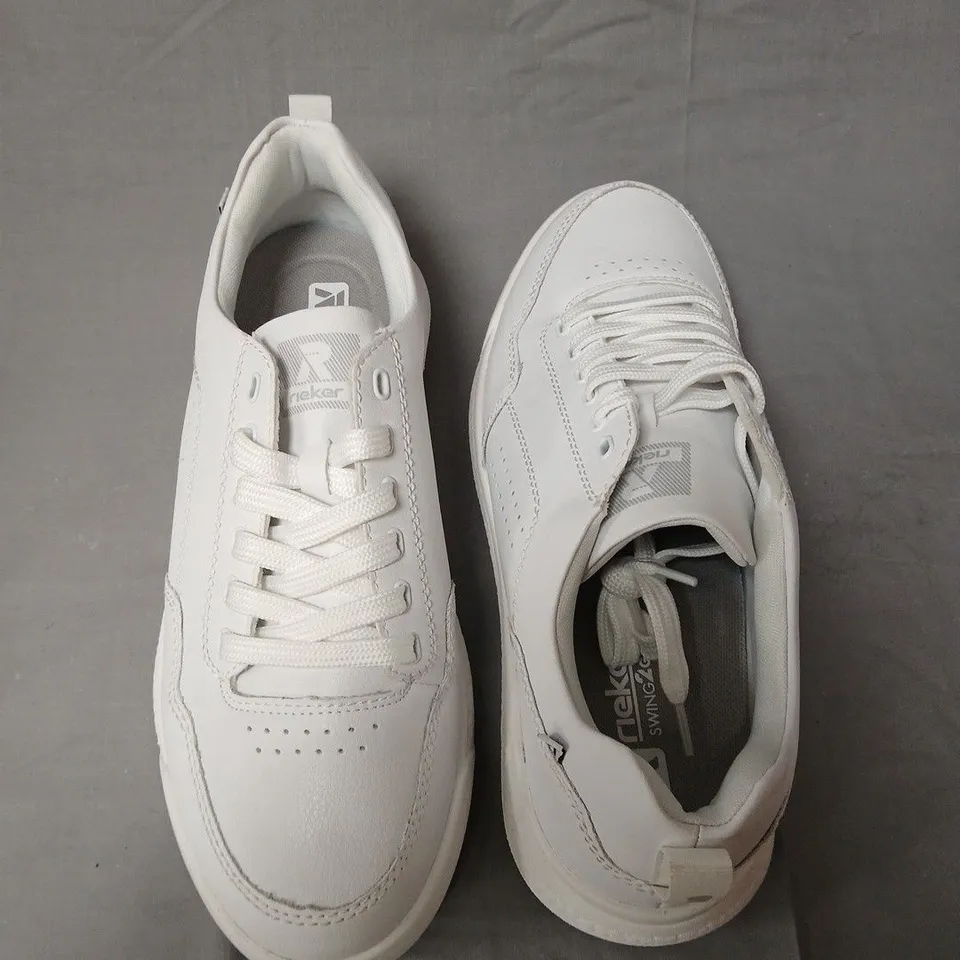 boxed pair of Rieker Women's traiuners in white - uk 7.5