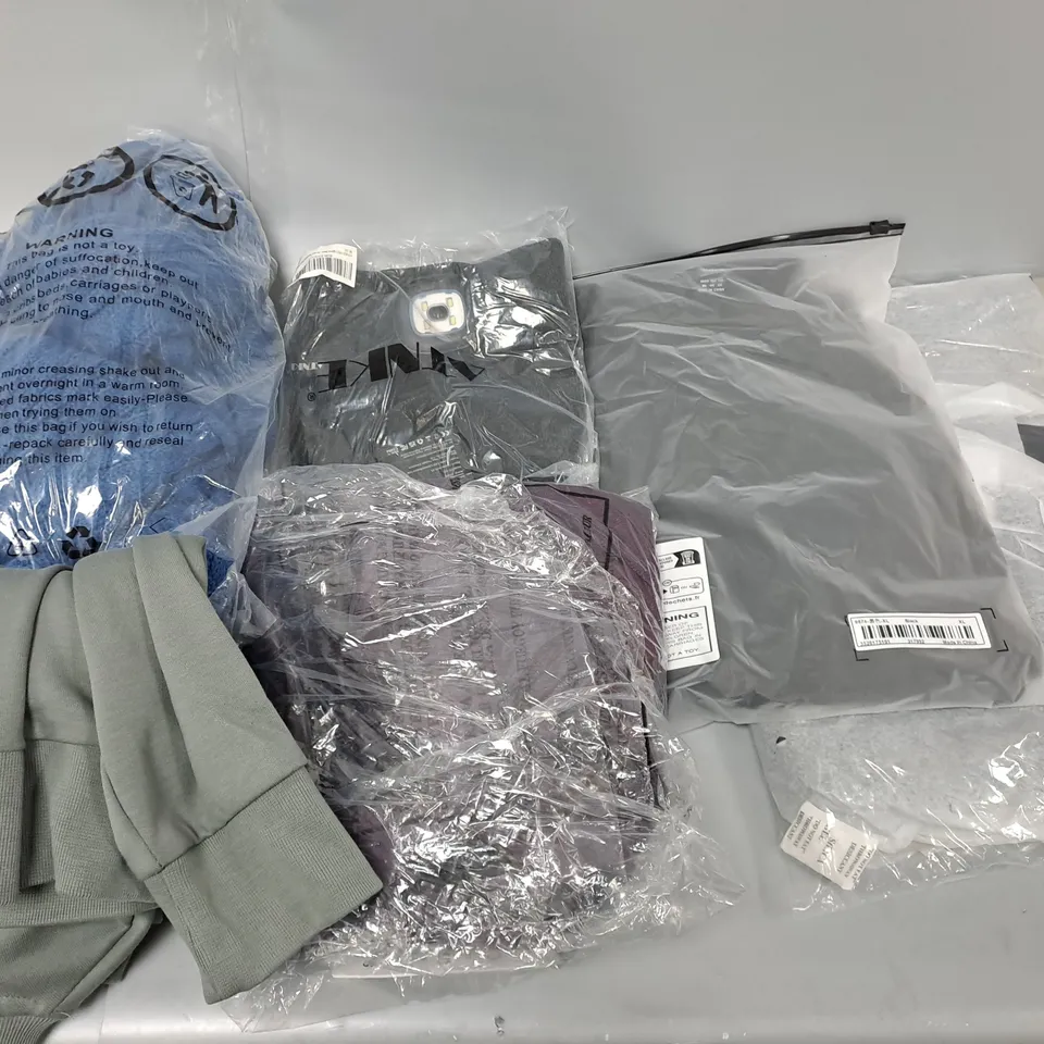LARGE BOX OF ASSORTED CLOTHING ITEMS IN VARIOUS COLOURS AND SIZES INCLUDING TROUSERS , TOPS AND JUMPERS 