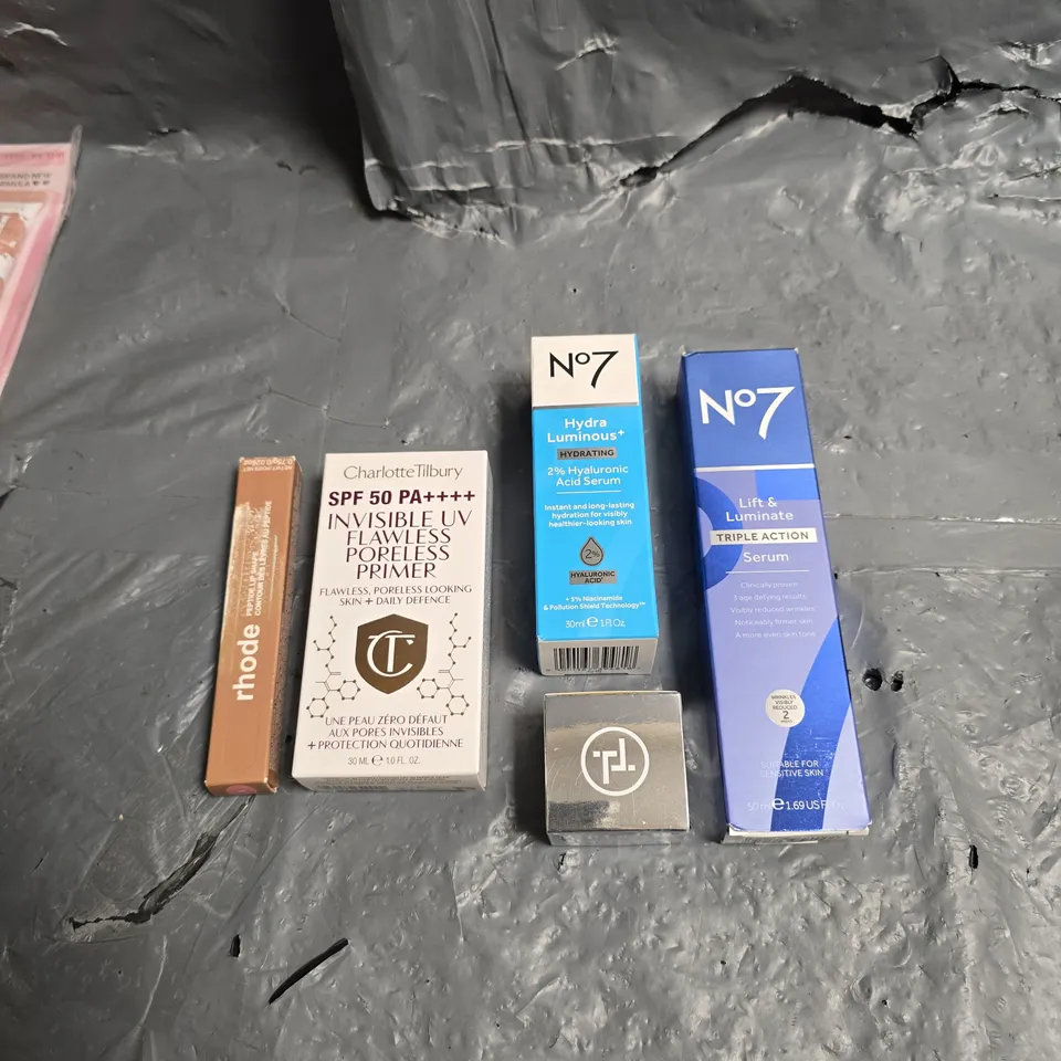 LOT OF 5 ASSORTED COSMETIC PRODUCTS TO INCLUDE - N07 LIFT & LUMINATE SERUM - CHARLOTTE TILBURY UV PORELESS PRIMER - TRINNY LONDON T-POT - ETC