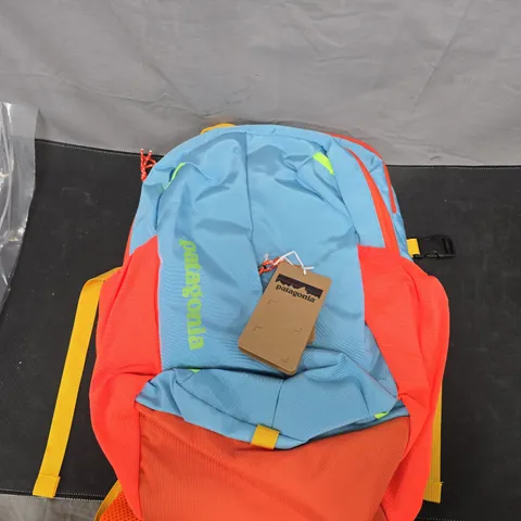 PATAGONIA BACKPACK – LIGHT BLUE WITH ORANGE PANELS AND YELLOW STRAPS