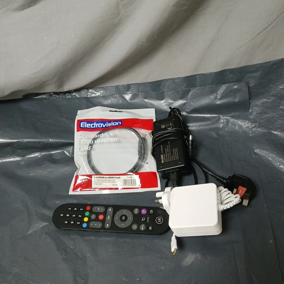 APPROXIMATELY 15 ASSORTED HOUSEHOLD ITEMS TO INCLUDE REMOTE CONTROL, POWER ADAPTERS, HDMI CABLE ETC