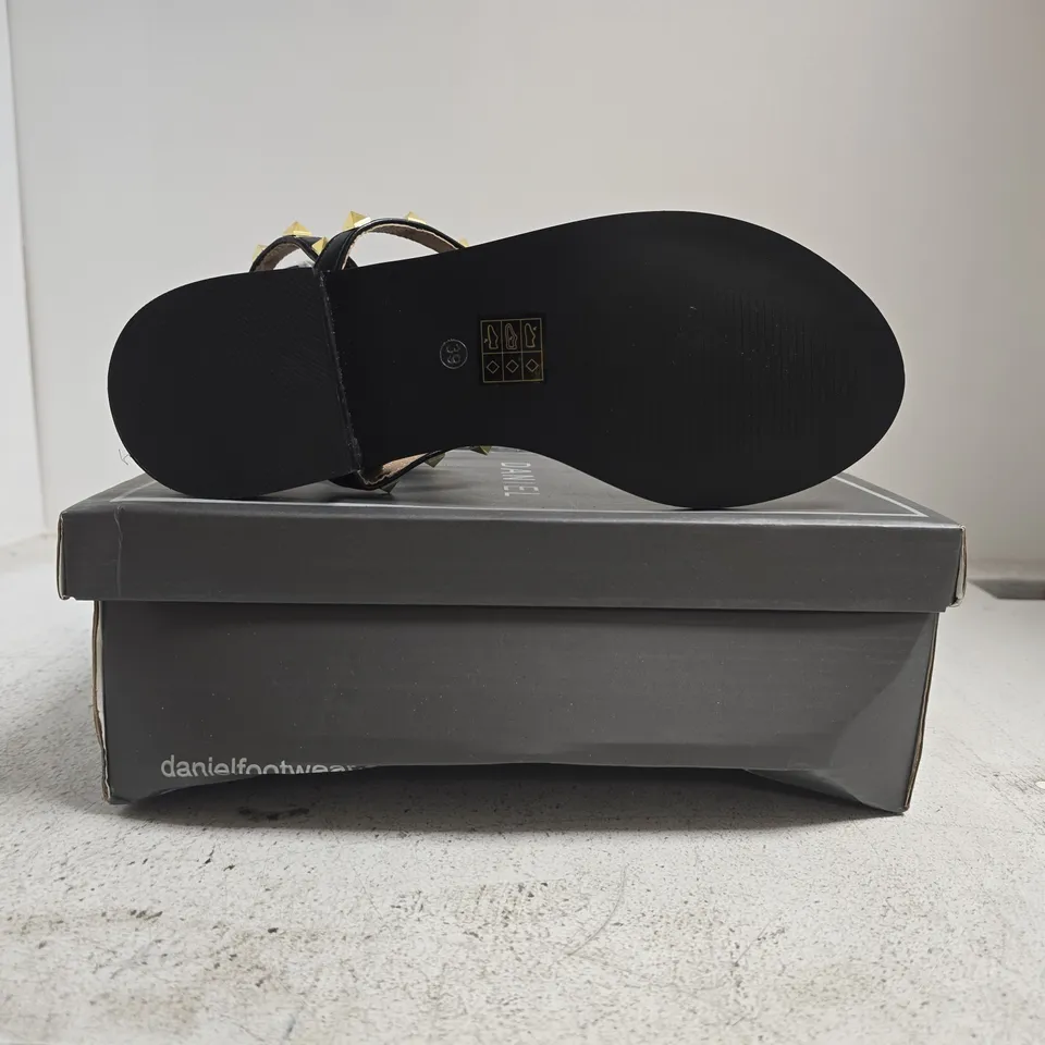 BOXED PAIR OF DANIEL TOE-POST STRAPPY SANDALS IN BLACK W. GOLD STUDS SIZE EU 39