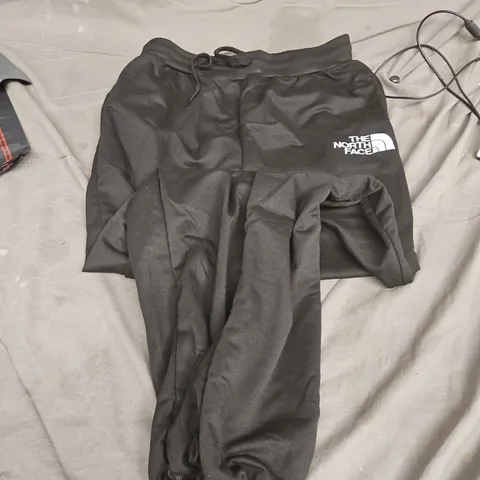 The North Face black drawstring pants (XXL) + TOCO Pine Green bikini set (XL)