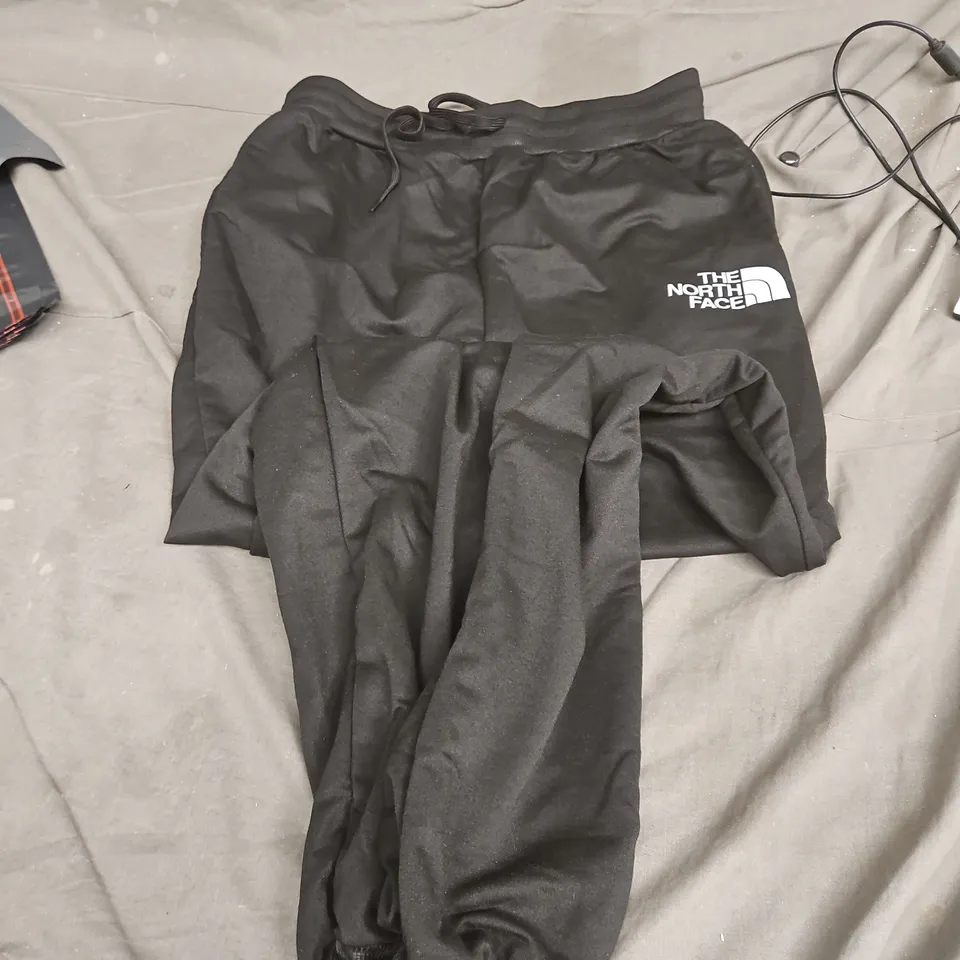 The North Face black drawstring pants (XXL) + TOCO Pine Green bikini set (XL)