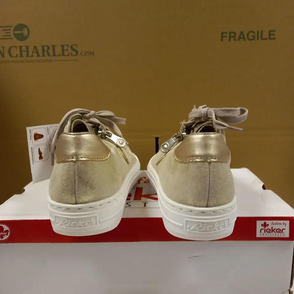 BOXED PAIR OF RIEKER GOLD METALLIC TRAINERS - SIZE 6