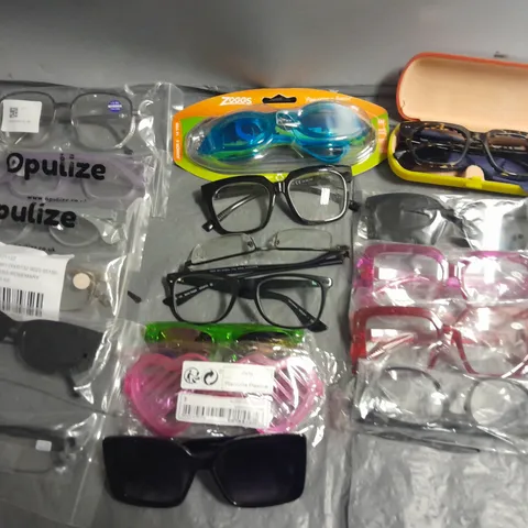 LOT OF APPROXIMATELY 30 ASSORTED PAIRS OF GLASSES TO INCLUDE WOLF, ZOGGS AND PULIZE