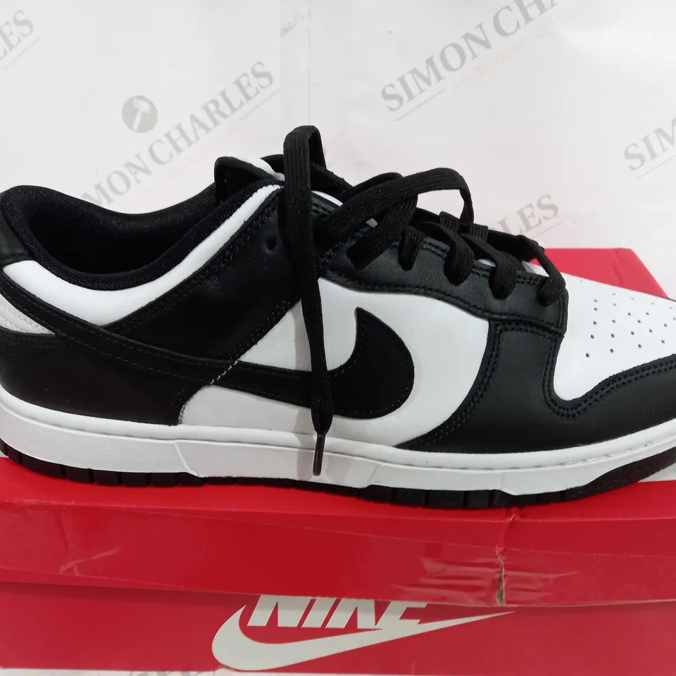 BOXED PAIR OF NIKE DUNK LOW RETRO BLACK/WHITE - UK 12