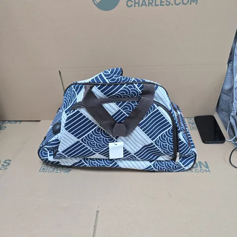 CARRY-ON ROLLING SUITCASE WITH BLUE GEOMETRIC PATTERN