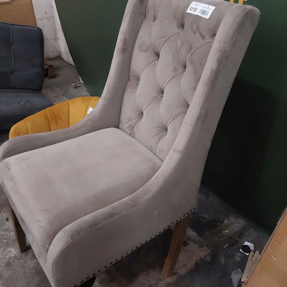 TWO DESIGNER UPHOLSTERED CHAIRS